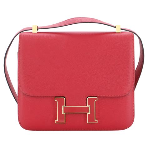 How do you open a Hermès Constance handbag without  